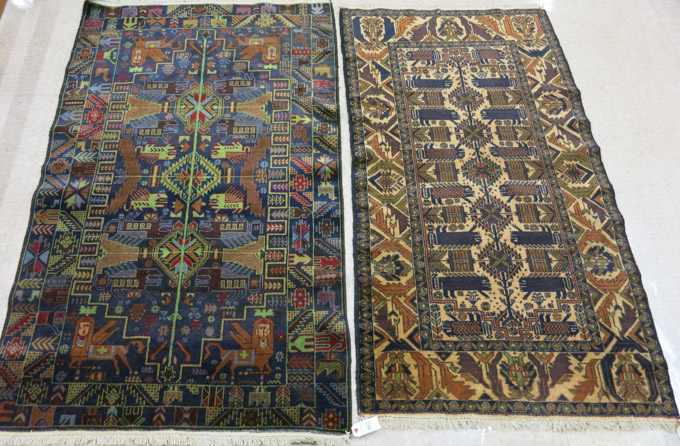 Appraisal: TWO AFGHAN TRIBAL AREA RUGS hand knotted ' x '