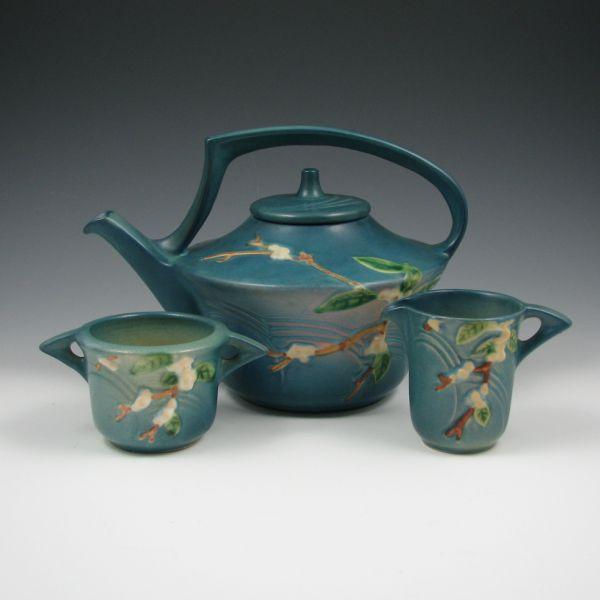 Appraisal: Roseville Snowberry tea set in blue with TP lidded teapot