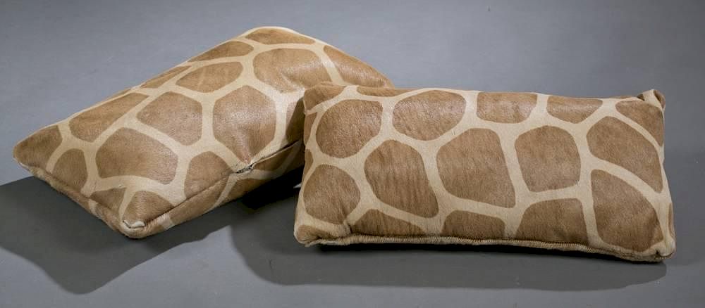 Appraisal: A pair of giraffe skin pillows A pair of giraffe