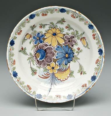 Appraisal: Delft shallow bowl polychromed bouquet of flowers with floral and