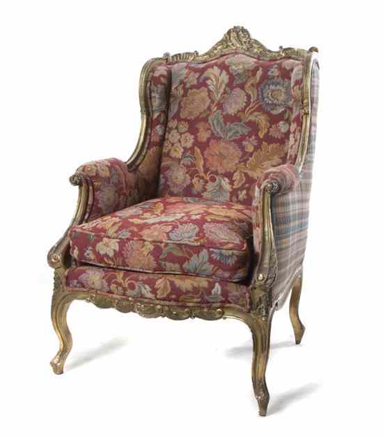 Appraisal: A Louis XV Style Giltwood Bergere a Oreilles having a