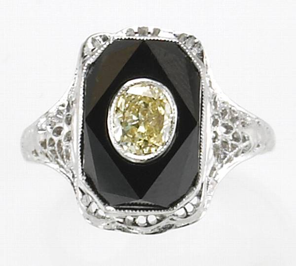 Appraisal: A diamond black onyx k and k white gold ring