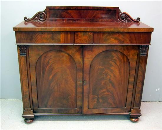 Appraisal: th century mahogany and crossbanded chiffonier with raised and carved