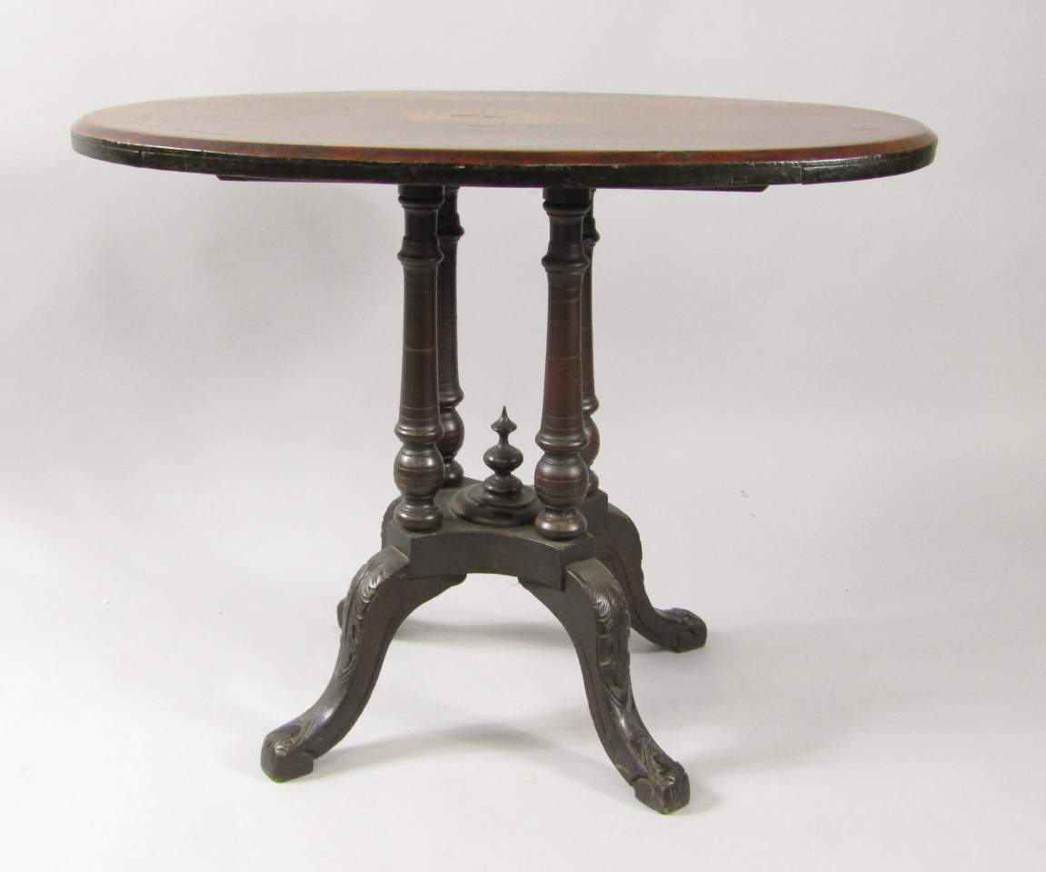 Appraisal: A Victorian mahogany and inlaid tilt top loo table the