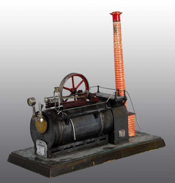 Appraisal: Bing No Stationary Steam Engine Toy Description Stationary overtype steam