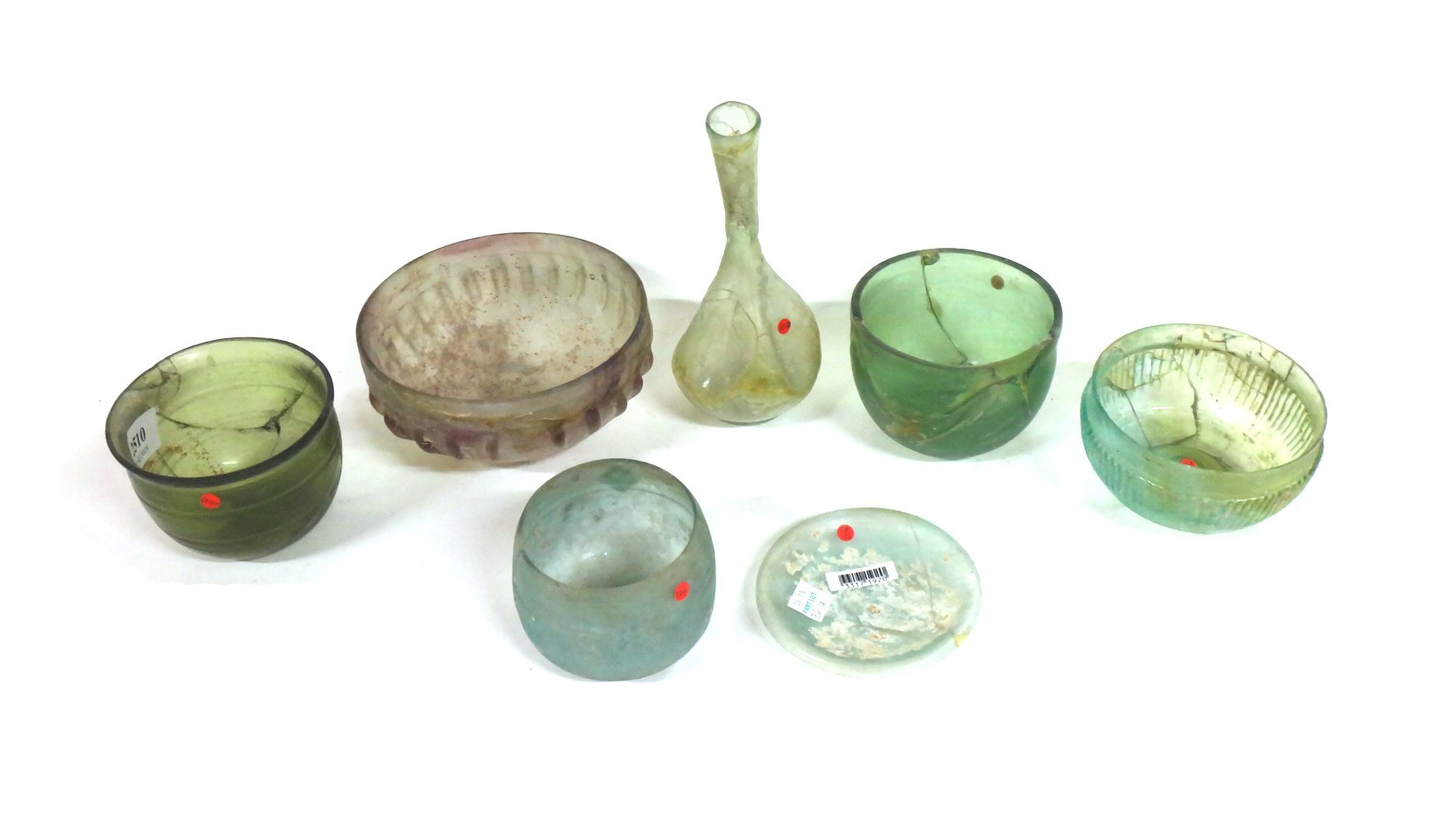 Appraisal: A group of seven pieces of Roman and Persian glass