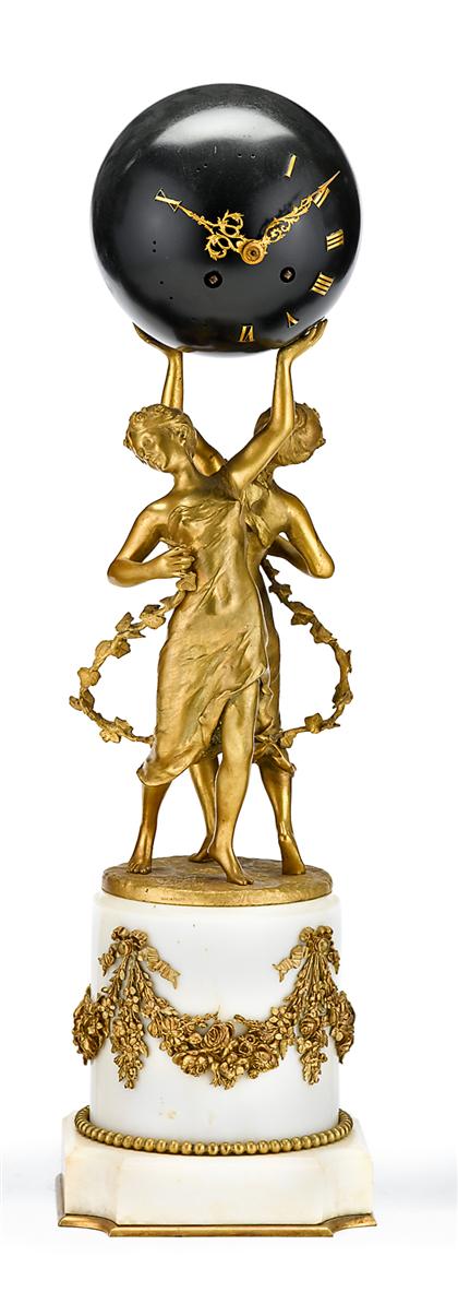 Appraisal: French gilt bronze and marble clock after henri godet french