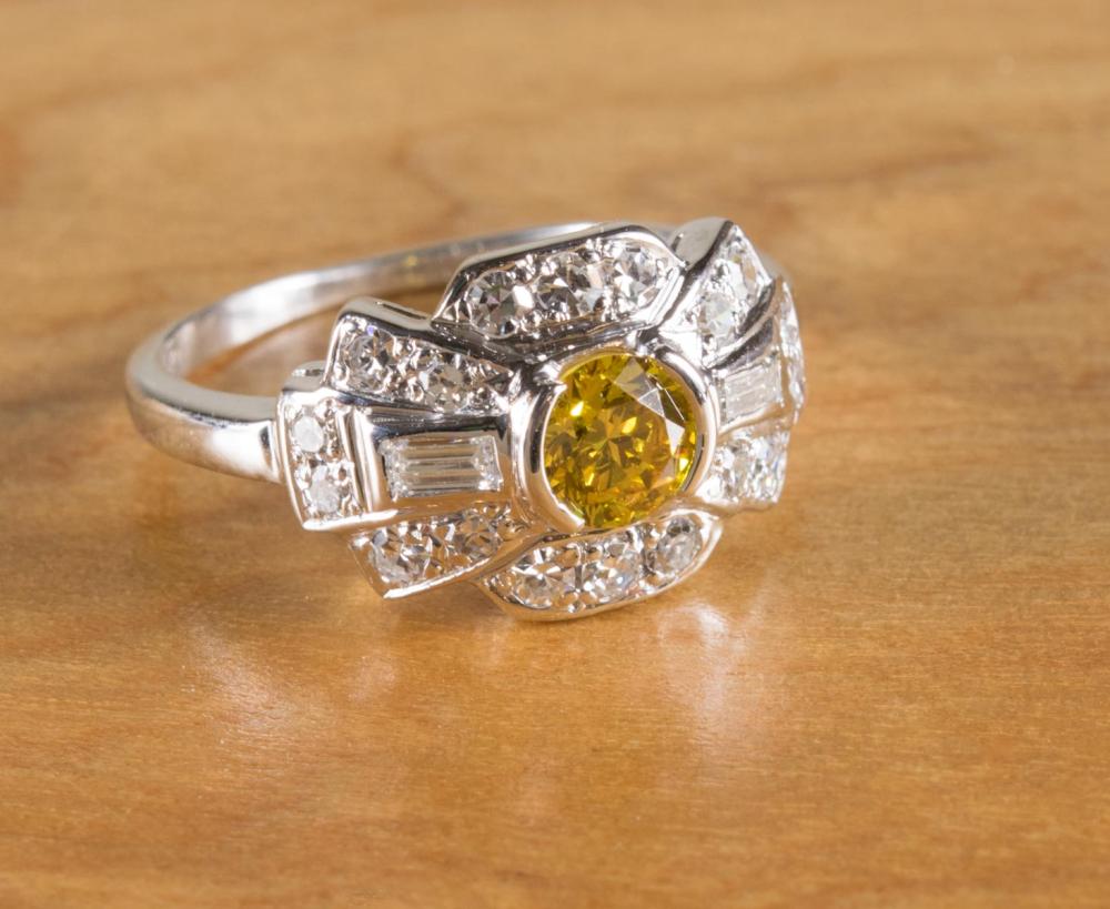 Appraisal: FANCY YELLOW DIAMOND AND FOURTEEN KARAT GOLD RING The k