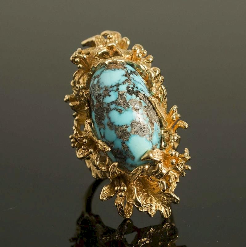 Appraisal: Turquoise k Ring Turquoise k ring in leaf motif setting