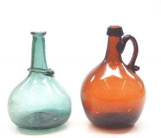 Appraisal: Free Two th and th century free-blown glass globular bottles