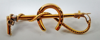 Appraisal: ct gold brooch as a riding crop and horseshoe grams