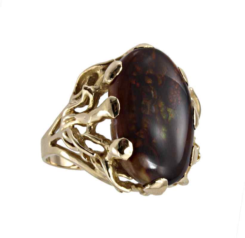 Appraisal: K GOLD FIRE AGATE RING K yellow gold ring contains