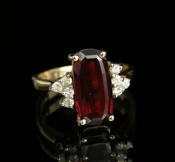 Appraisal: A Ladies' Garnet and Diamond Ring k yellow gold mount