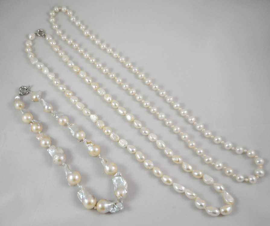 Appraisal: THREE STRANDS OF WHITE PEARL NECKLACES including an - inch