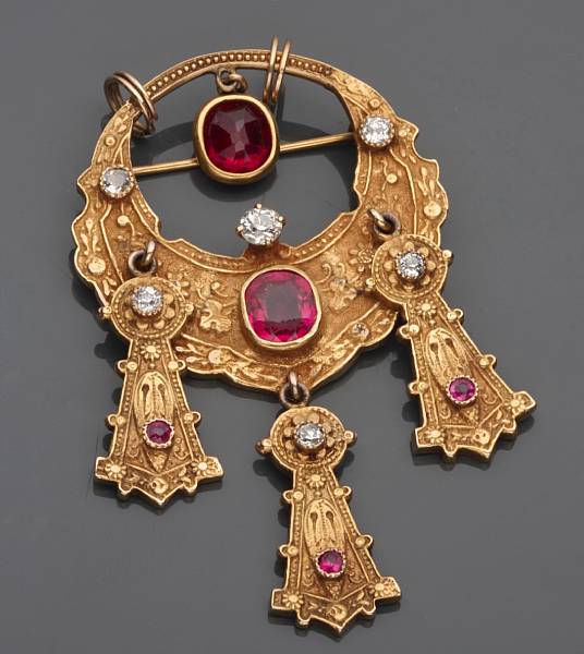 Appraisal: A diamond red stone and k gold brooch part of