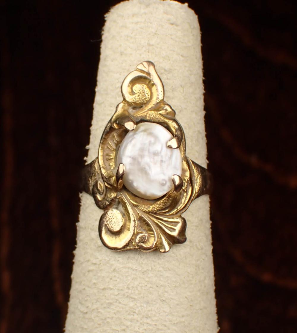 Appraisal: BAROQUE PEARL AND FOURTEEN KARAT GOLD RING The yellow gold