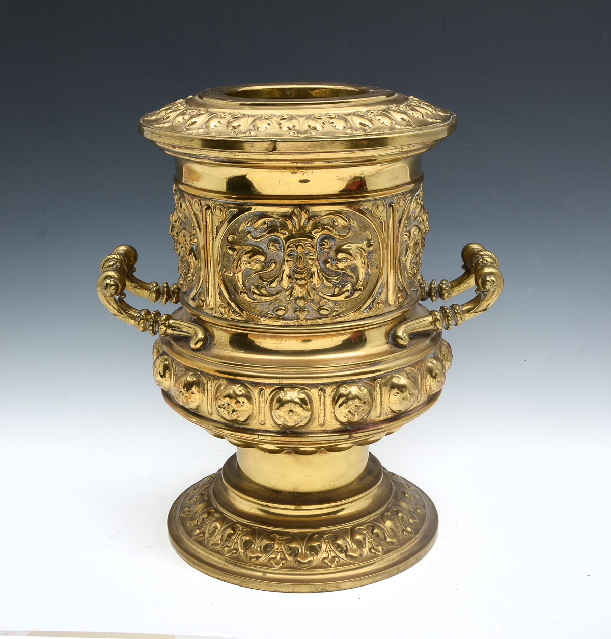 Appraisal: EMBOSSED BRASS CHAMPAGNE COOLER French style embossed brass wine cooler