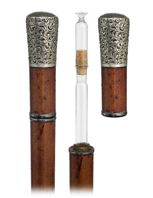 Appraisal: Tippler Cane -Ca -Large and well chased white metal knob