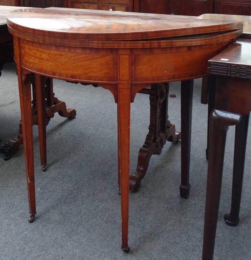 Appraisal: A George III inlaid satinwood semi-elliptic card table on tapering