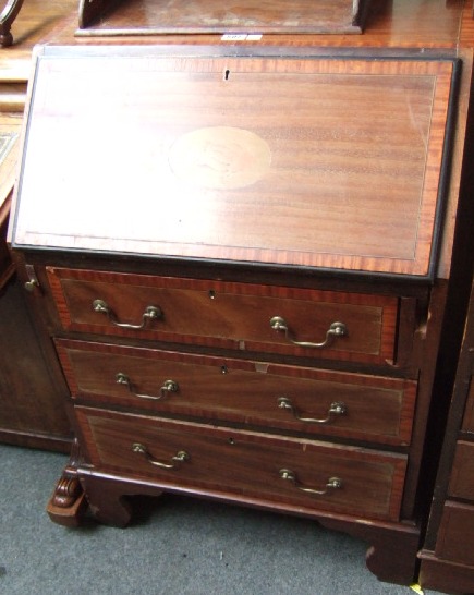 Appraisal: An Edwardian inlaid mahogany bureau the fall with conch shell