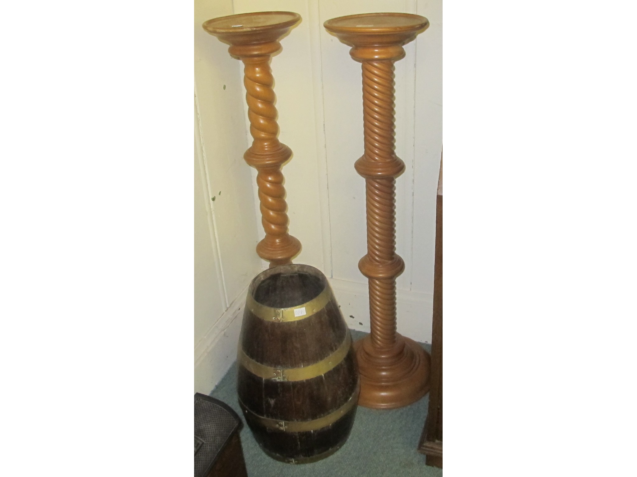 Appraisal: Two plant stands and a stick stand