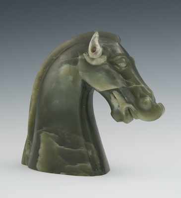 Appraisal: A Carved Spinach Jade Horse Head Carved in the archaic