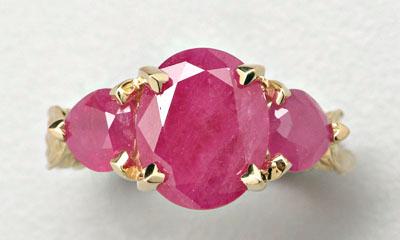 Appraisal: Lady's ruby ring centering one oval faceted ruby estimated weight