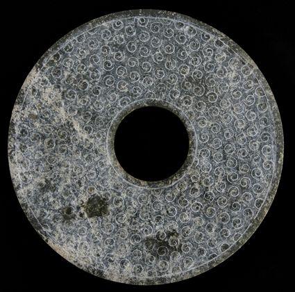 Appraisal: ARCHAIC CHINESE CARVED JADE BI DISC Incised at either side