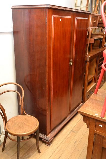 Appraisal: A MAHOGANY TWO DOOR WARDROBE