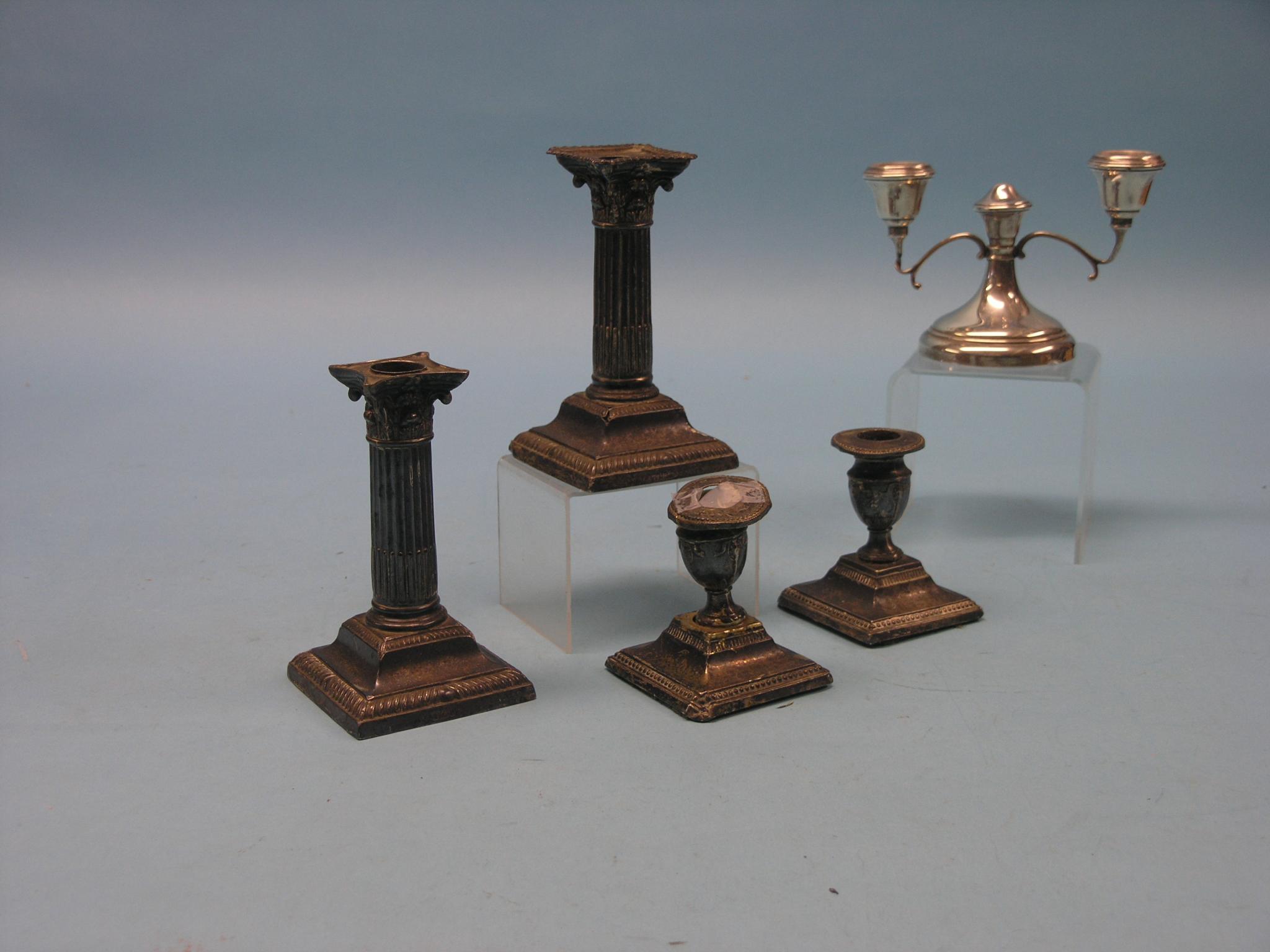 Appraisal: A pair of silver Corinthian candlesticks in - marks rubbed