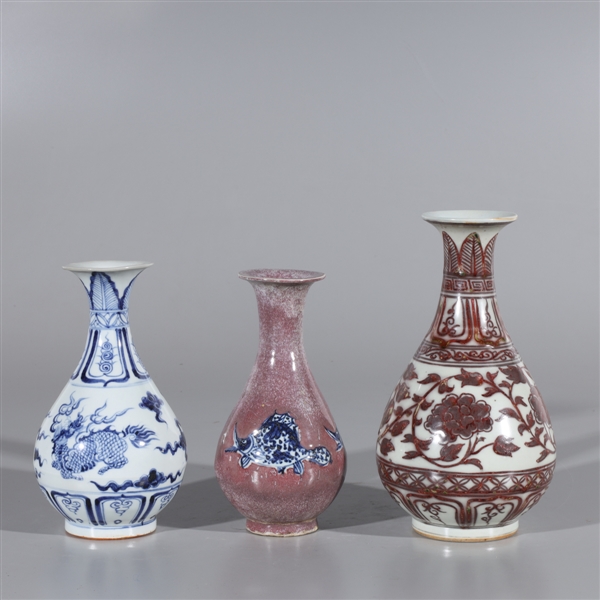 Appraisal: Group of three Chinese porcelain vases including one blue and