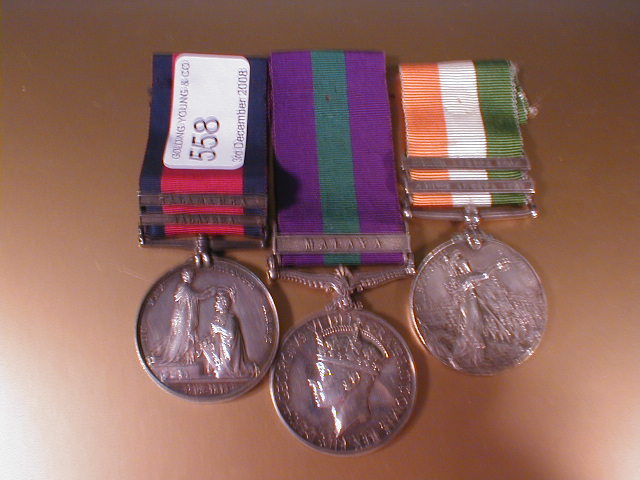 Appraisal: Three medals including J Holland Coldstream Guards campaign medal with