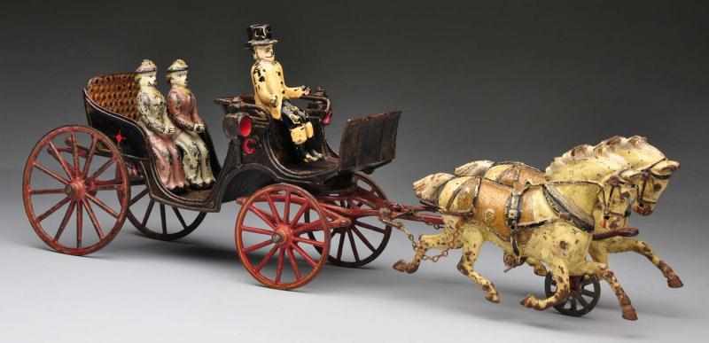 Appraisal: Cast Iron Open Carriage Horse-Drawn Toy Description Made by Pratt