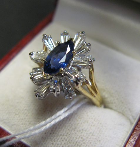 Appraisal: SAPPHIRE DIAMOND AND FOURTEEN KARAT GOLD RING Prong set tapered