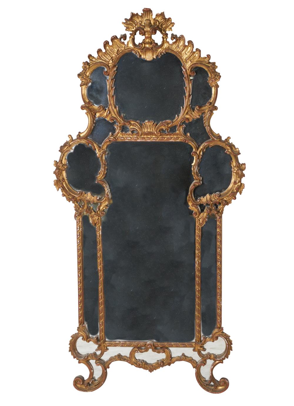 Appraisal: ITALIAN ROCOCO-STYLE GILTWOOD WALL MIRRORearly th century with flat mirror