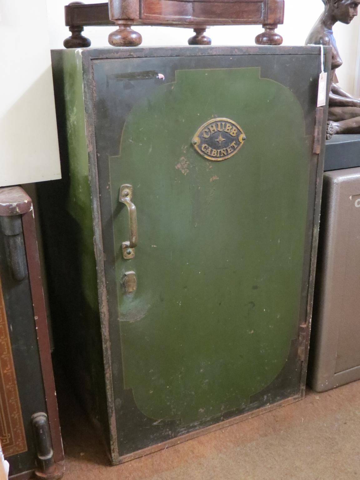 Appraisal: A Chubb Cabinet safe painted cast iron with three enclosed