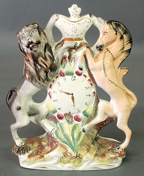 Appraisal: Staffordshire figural clock tower group of the Royal Coat of