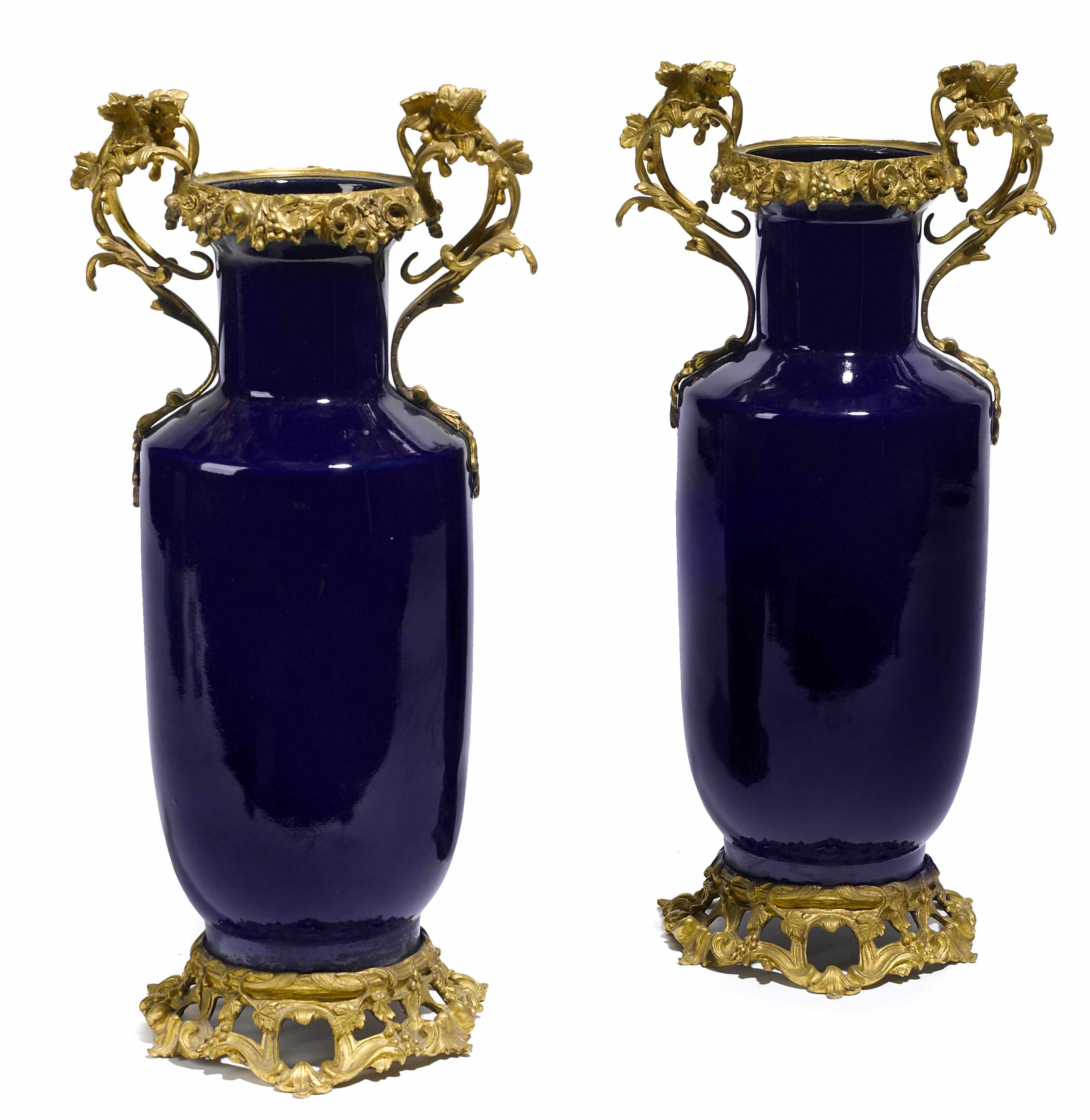 Appraisal: A pair of Roccoco style gilt bronze mounted vases height