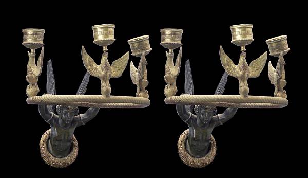 Appraisal: A pair of Empire patinated and gilt bronze three light