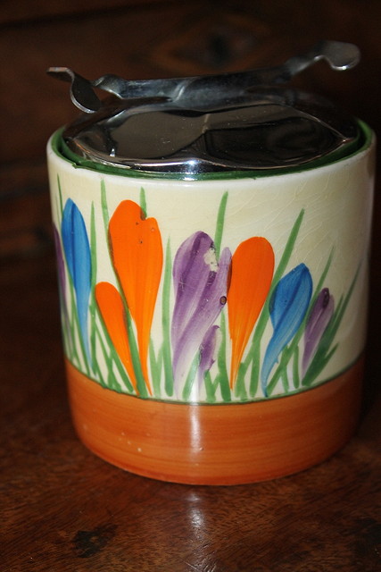 Appraisal: A CLARICE CLIFF AUTUMN CROCUS SUGAR POT and cover