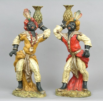 Appraisal: A Pair of Blackamoor Statues A pair of polychrome ceramic