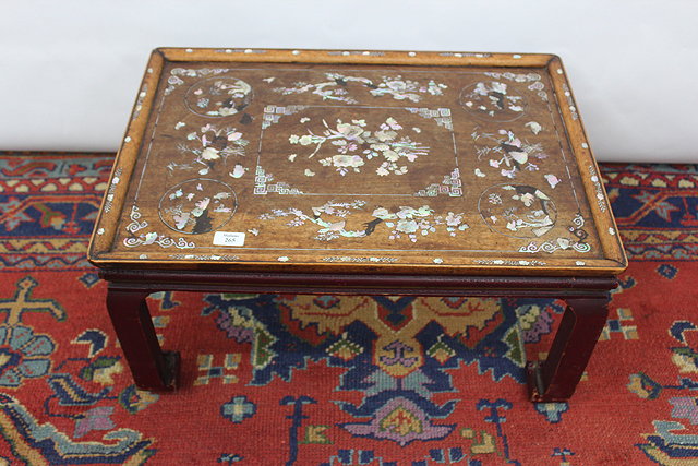 Appraisal: AN ORIENTAL ROSEWOOD RECTANGULAR TOPPED LOW OCCASIONAL TABLE with decorative