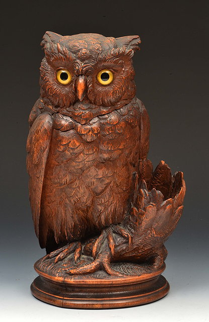 Appraisal: Victorian carved oak figure of an owlstanding on a branch