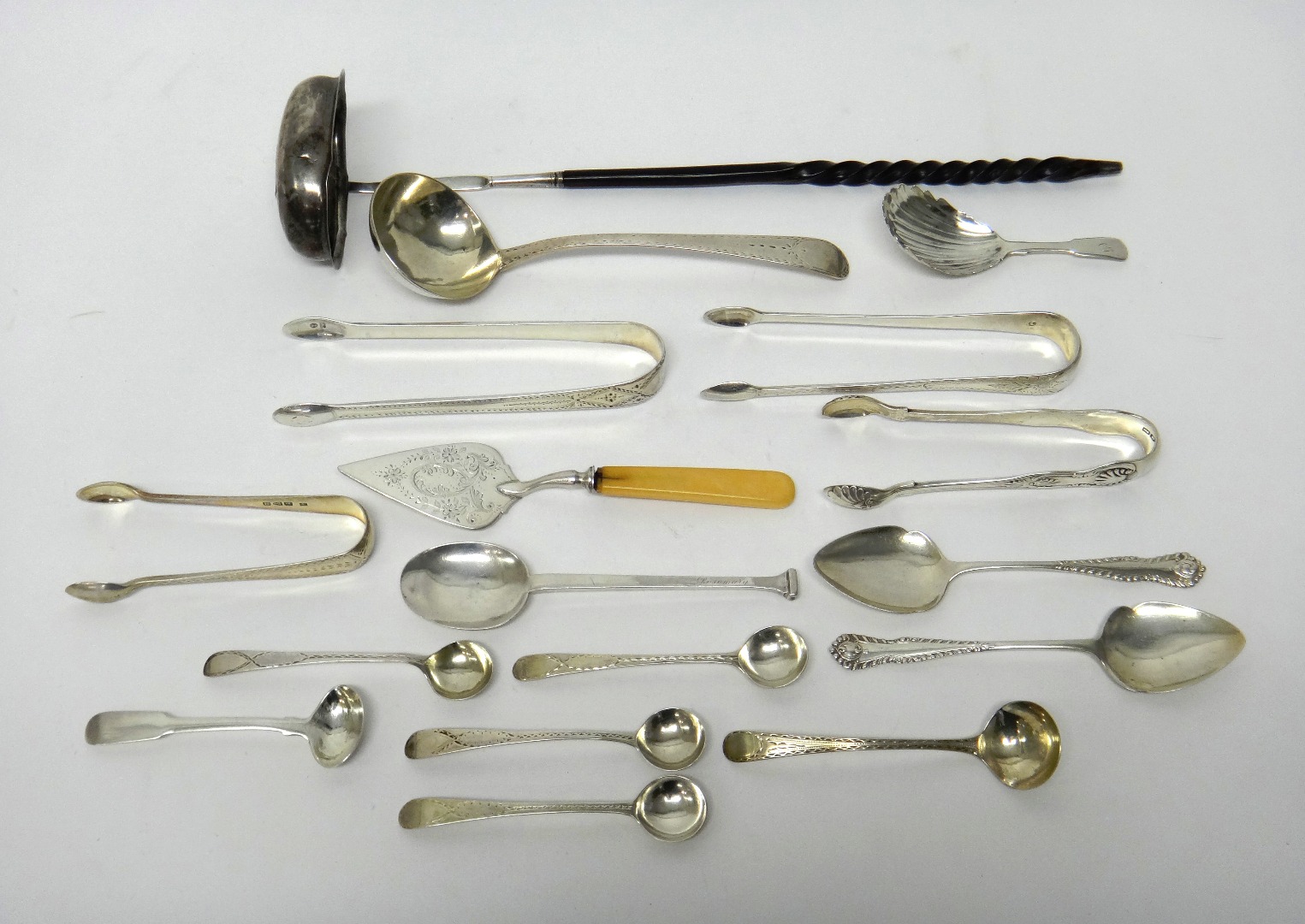 Appraisal: Silver and silver mounted flatware comprising four pairs of sugar