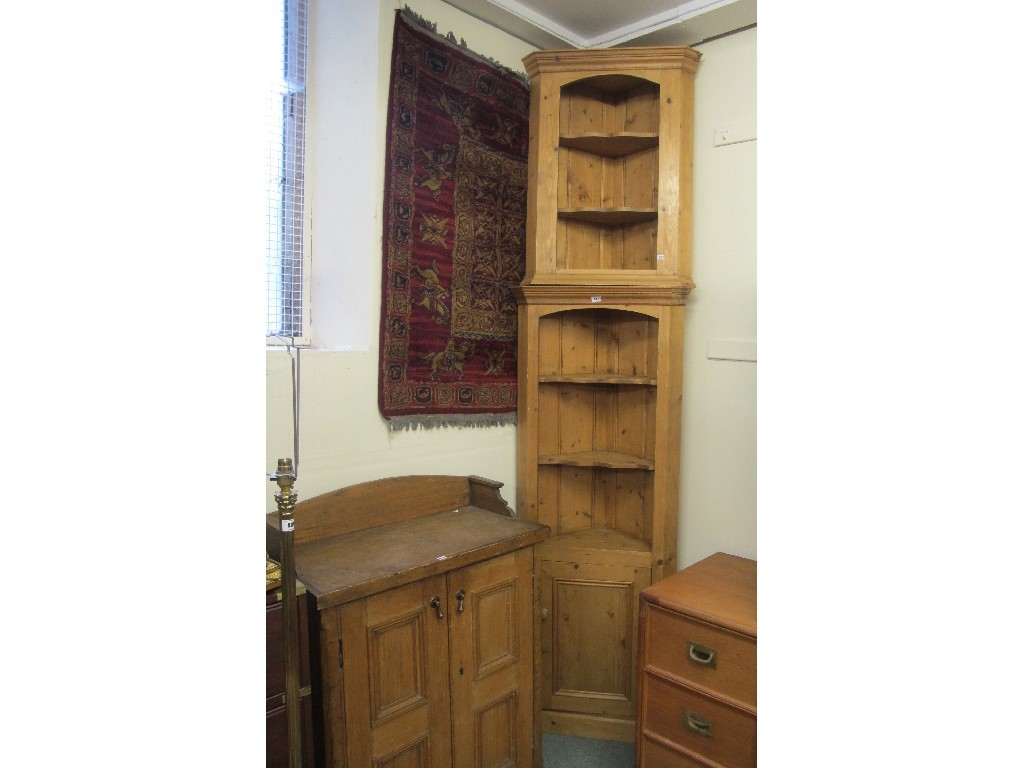 Appraisal: Two pine corner cupboards and a pine two door cupboard