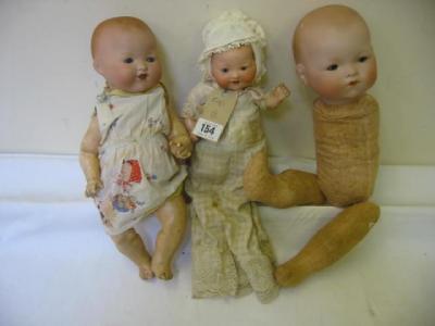 Appraisal: An Armand Marseille bisque head baby doll with brown sleeping