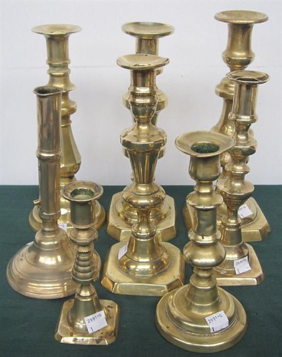 Appraisal: LARGE GROUP OF BRASS CANDLESTICKS Total nine pieces