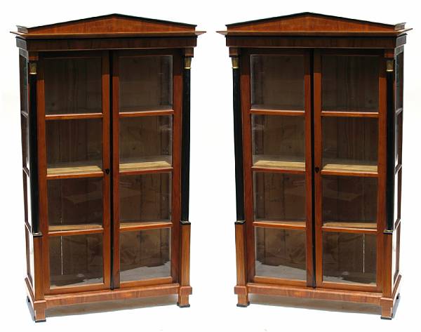 Appraisal: A pair of Beidermeier style vitrine cabinets height ft in