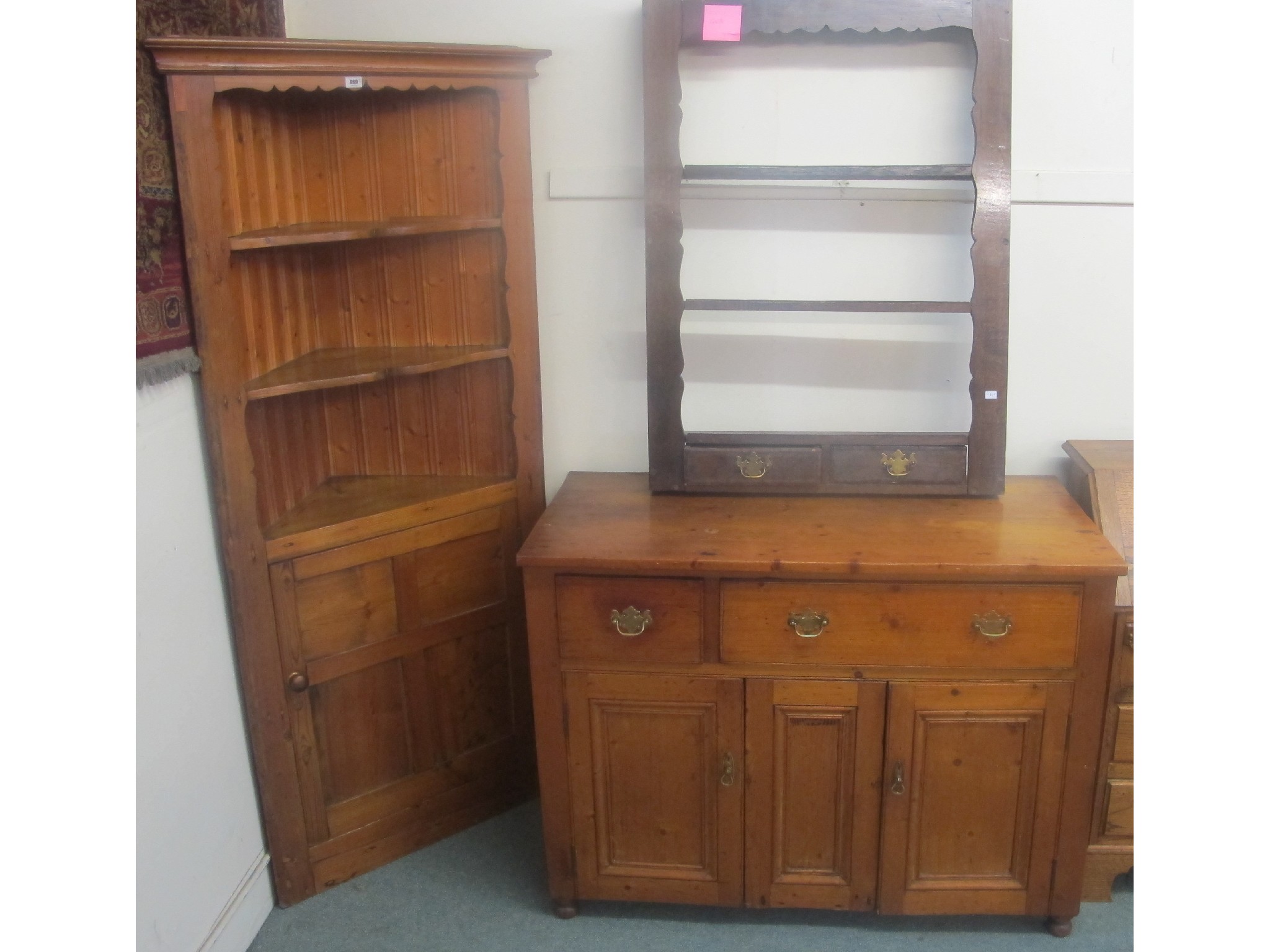 Appraisal: A pine corner unit and a pine dresser and wall