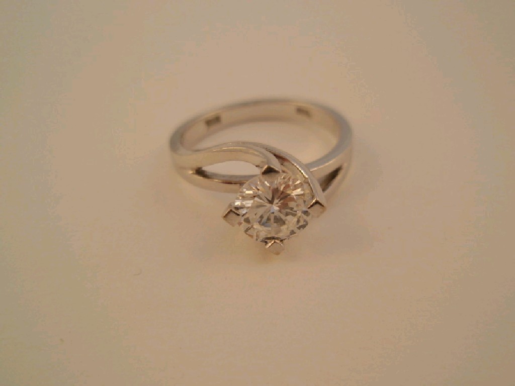 Appraisal: A solitaire diamond ring the round brilliant cut stone of